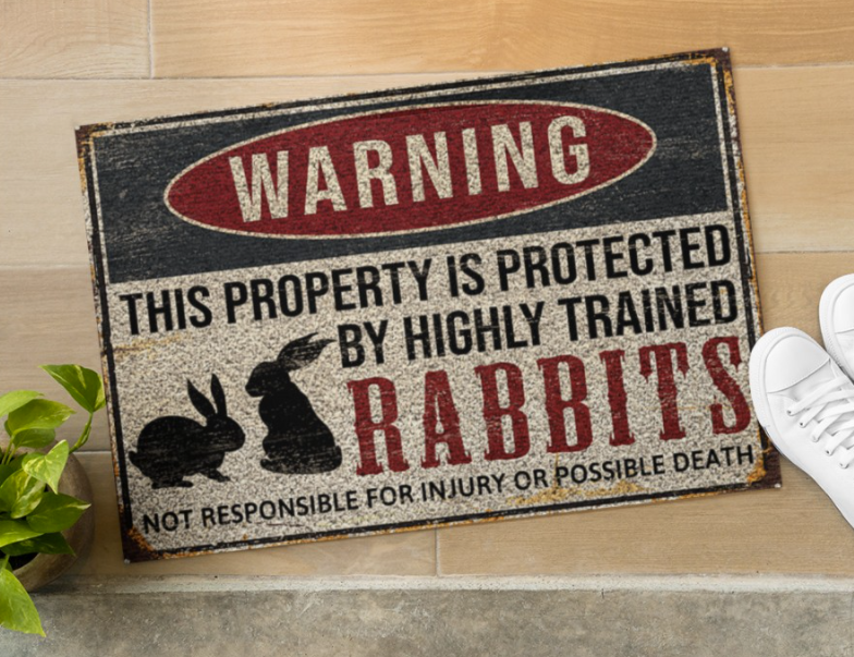 Warning this property is protected by highly trained rabbits doormat 1
